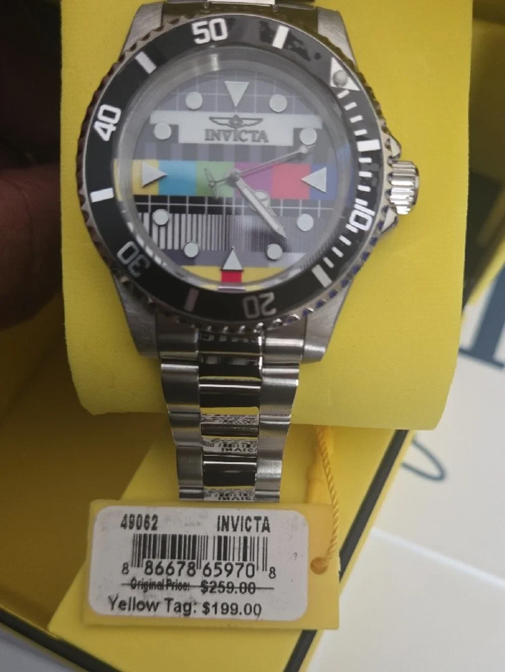 Invicta Men’s Pro Diver Silver Watch with Black Bezel and Multi-Color Dial